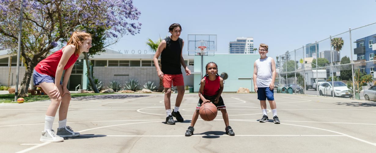 teenagers playing basketball - Photo by RODNAE Productions from Pexels