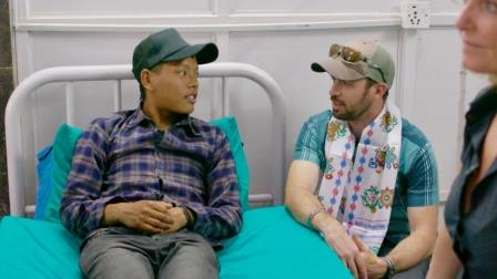Chris at the hospital in Nepal with a young Nepalese man with haemophilia